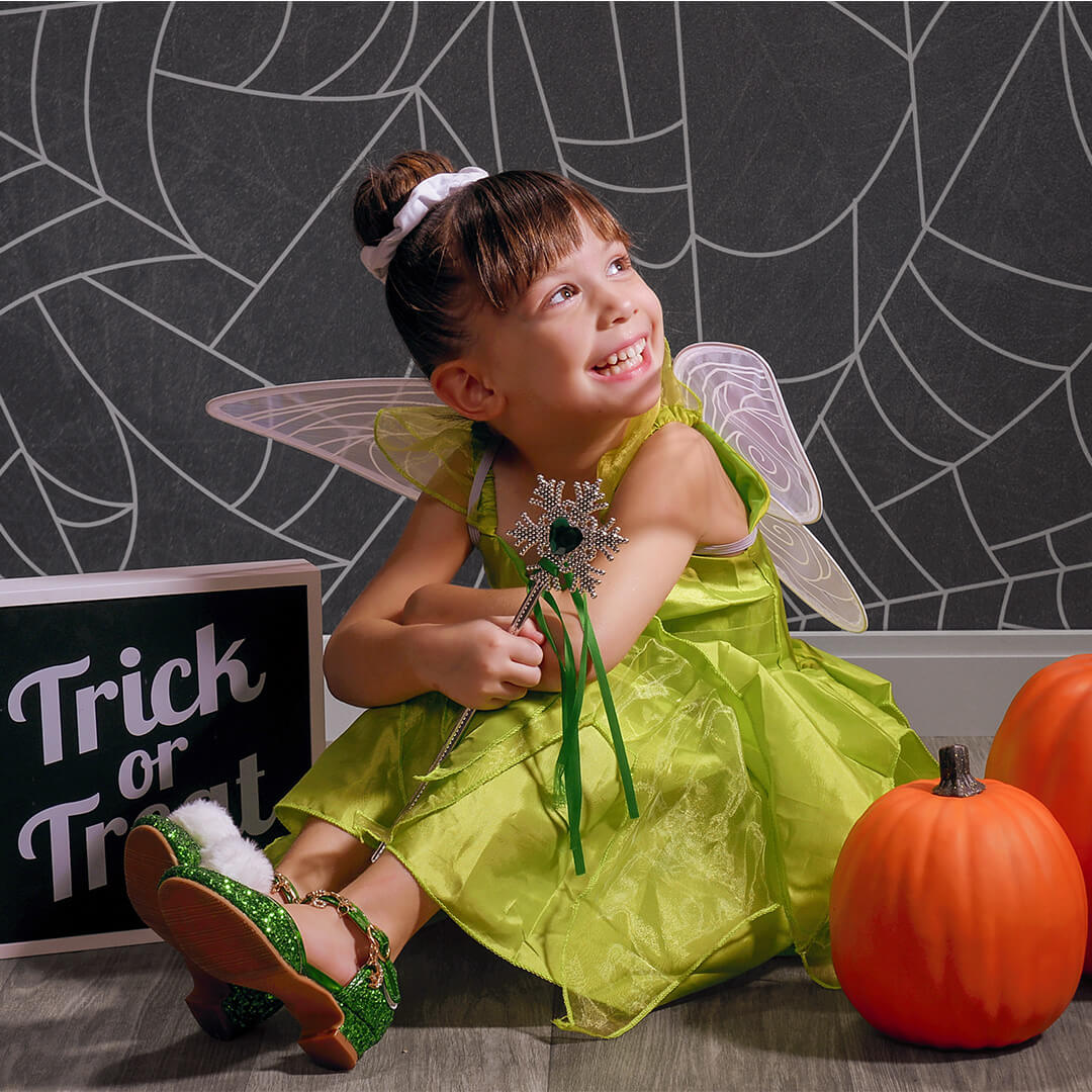 Girl in a fairy dress for professional kids Halloween photos at JCPenney Portraits.