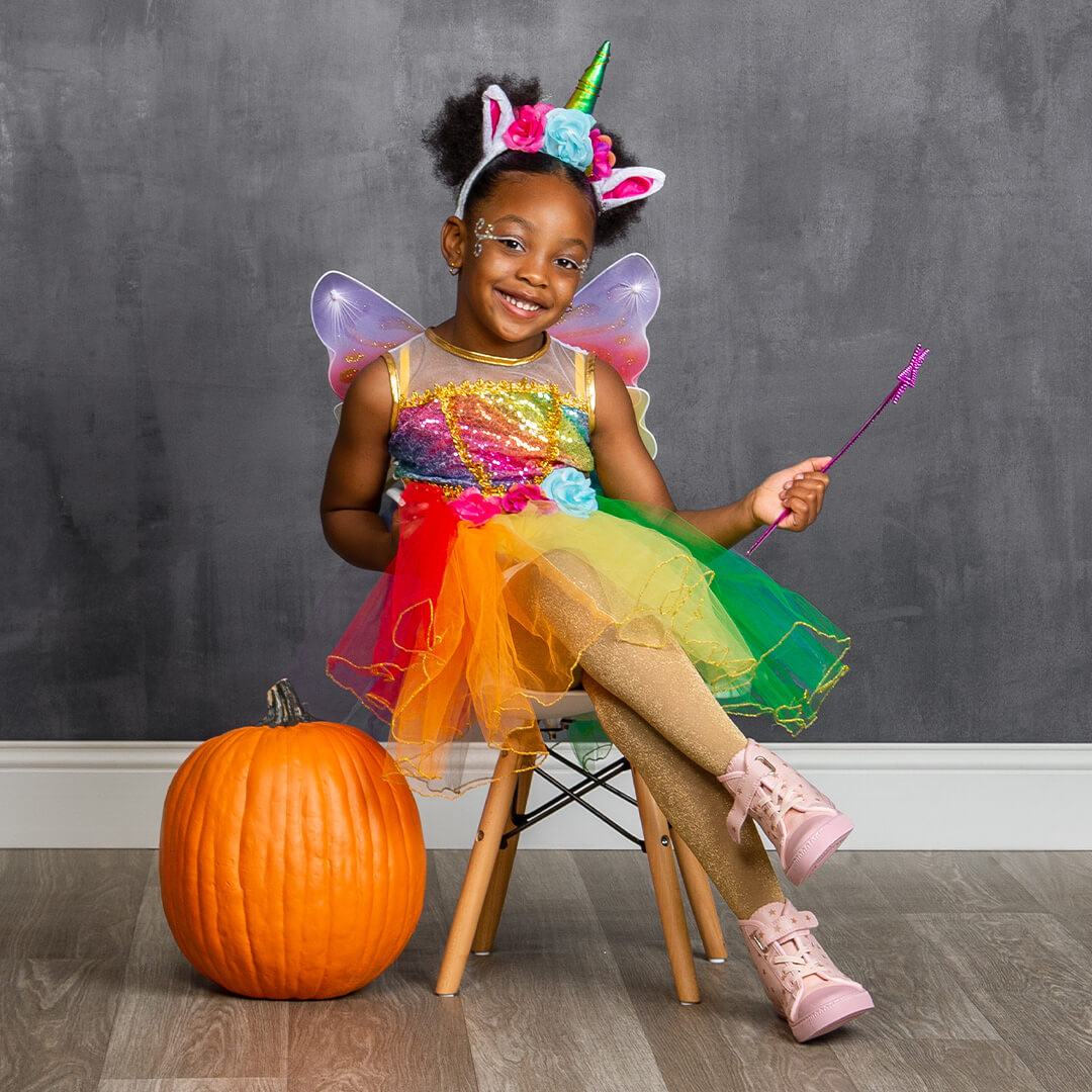 Girl in a fairy dress for Halloween photoshoot at JCPenney Portraits.