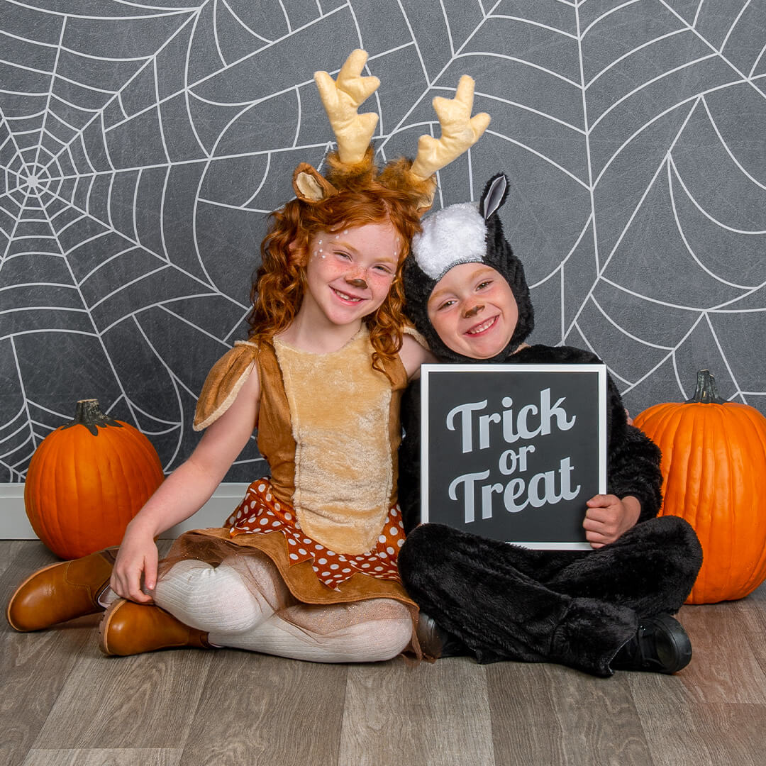 Siblings Halloween kids photoshoot at JCPenney Portraits.