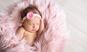 Precious newborn photos captured at JCPenney Portraits by our professional newborn photographers.