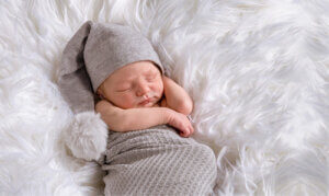 Professional newborn photos captured at JCPenney Portrait studios by newborn photographer.
