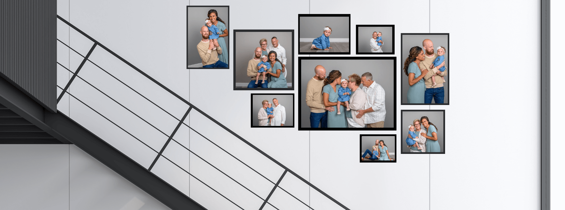 Portraits above a staircase with photos from a family JCPenney Portraits sessions.