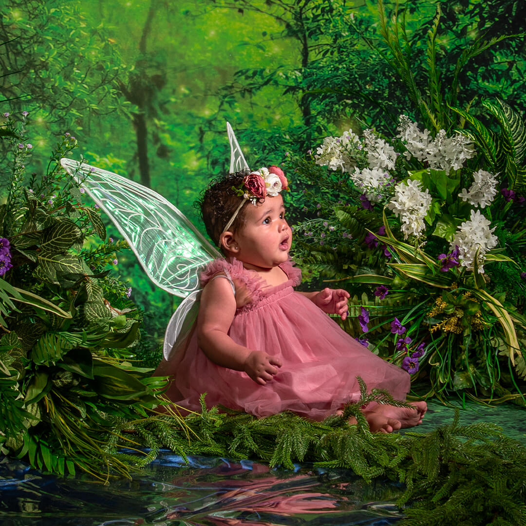 Baby posing for fairy photos at JCPenney Portraits.