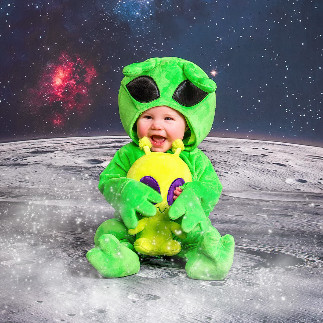 Baby in an alien costume for space pictures.