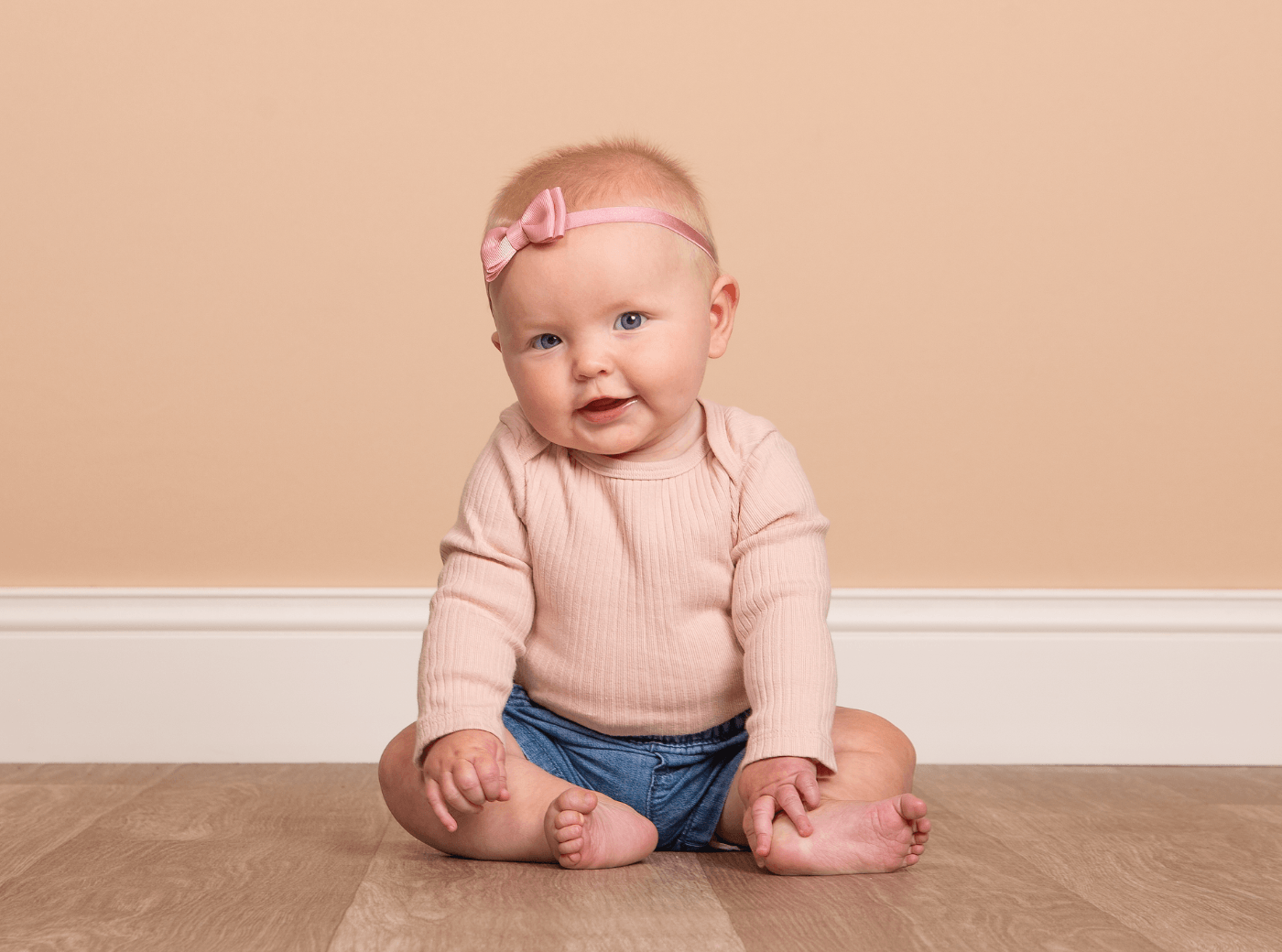6 month baby photos taken at JCPenney Portraits.